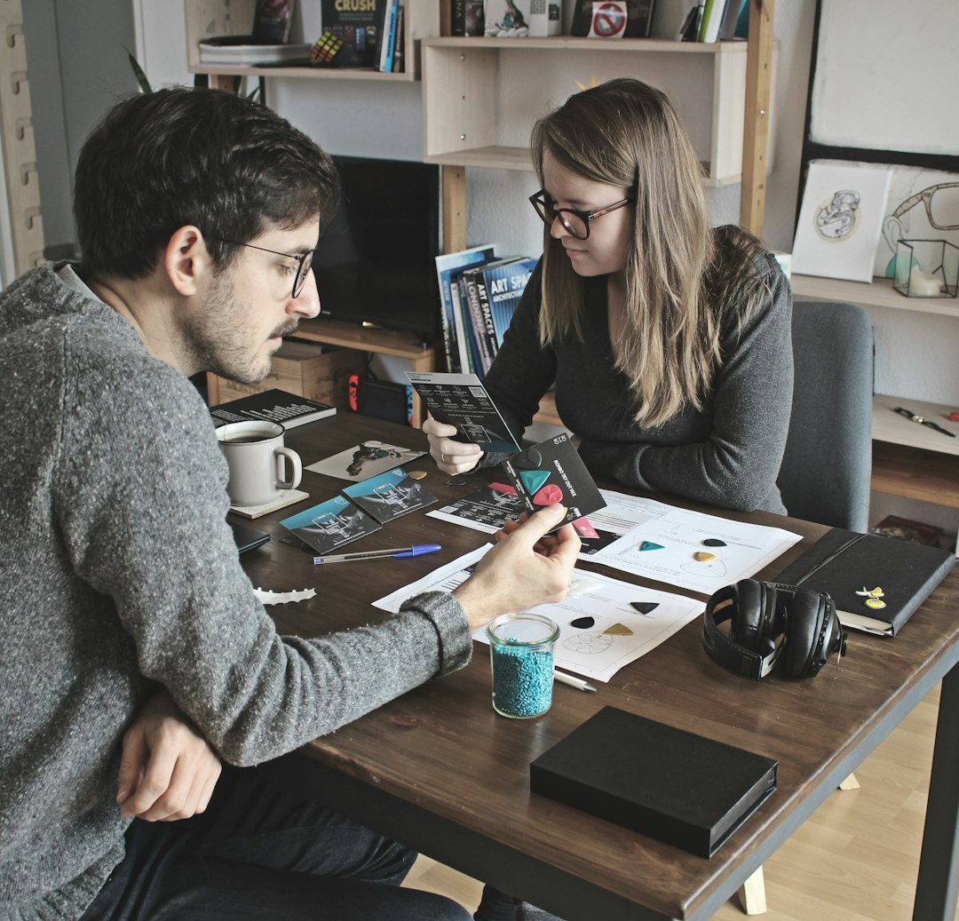 Diverse group of people brainstorming around a table