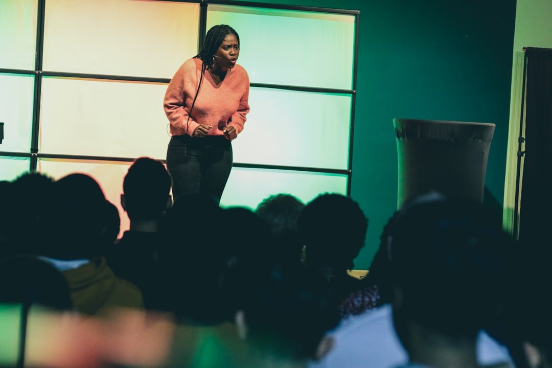 confident speaker on stage